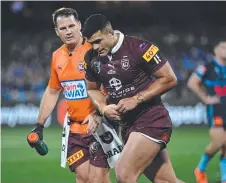  ?? ?? David Fifita comes off for a HIA in Origin I. Picture: NRL photos