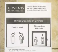  ?? COLIN PERKEL/THE CANADIAN PRESS FILES ?? A sign urging physical distancing when using elevators is seen in a highrise building in Toronto.