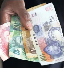  ?? PHOTO: EPA ?? The rand continues to weaken against the US dollar and euro after S&P’s April 3 downgrade of South Africa’s sovereign credit rating to BB+, following President Jacob Zuma’s sacking of Pravin Gordhan as finance minister on March 31. Tampering with the...