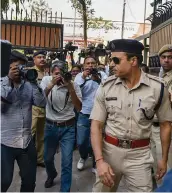  ?? — PTI ?? A police officer enters the residence of Delhi deputy chief minister Manish Sisodia in New Delhi on Friday.