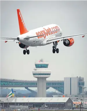  ??  ?? LANDING: EasyJet’s losses were not as bad as feared due to rivals’ troubles