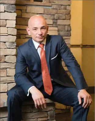  ?? TAYLOR GLENN, THE ASSOCIATED PRESS ?? Anthony Melchiorri, the star of Travel Channel’s “Hotel Impossible,” is entering his seventh season as the hotel fixer and is as passionate as ever about perfecting standards in the hospitalit­y industry.