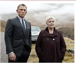  ??  ?? Bond boss...Dame Judi as M with Daniel Craig in 2012’s Skyfall