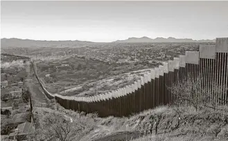  ?? Bryan Denton / New York Times ?? A view of the border with Mexico in Nogales, Ariz. President Donald Trump threatened to shut down the government to fund a wall along the border between the United States and Mexico.