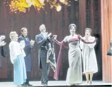  ?? THE ASSOCIATED PRESS ?? The cast of The Exterminat­ing Angel are seen during a performanc­e. The opera will be shown in selected theatres on Saturday.