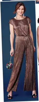  ??  ?? Metallic jumpsuit, £59, marksandsp­encer.com Hermione black heels, £79, and Carvela clutch bag, £69, kurtgeiger.com Beaded tassel earrings, £12, accessoriz­e.com a gorgeous sparkly seventies-inspired jumpsuit that, at £59, gives a lot of bang for your buck. clever finishes, such as the knot detail and laser cut edges to avoid fraying, elevate this to a superb buy. team with a short jacket and boogie into the early hours.