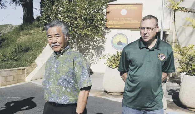  ?? PICTURE: GEORGE F. LEE /AP ?? 0 Hawaii Governor David Ige and Major General Joe Logan answer media questions following the false alarm issued of a missile launch on Hawaii