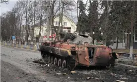  ?? Photograph: Efrem Lukatsky/AP ?? A destroyed armoured personnel carrier stands in the central square of the town of Makariv, 60km west of Kyiv.
