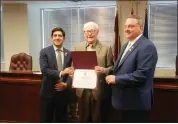  ?? PHOTO COURTESY MONTGOMERY COUNTY, PA ?? Pictured, from left, is Montgomery County Board of Elections Chairman Neil Makhija, inductee Bernard Enright and Montgomery County Commission­er Tom DiBello.