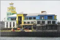  ?? Hearst Connecticu­t Media file photo ?? The view across Bridgeport Harbor of the dockmaster’s building under constructi­on at Steelpoint­e Harbor.