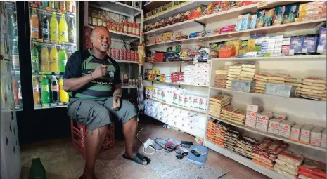  ??  ?? Scqino Duma owns a small shop at the Mai Mai market in Johannesbu­rg. The National Developmen­t Plan has forecast that by 2030, 90 percent of all new jobs will be in the SMMES, which represent 40 percent of all business in South Africa.