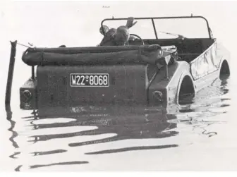  ??  ?? Its driver checking for leaks, the Type 597 demonstrat­ed its floatabili­ty. Like the Fletcher Flair it also achieved forward motion with its four driven wheels