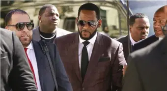  ?? Ap FILe ?? ‘JUSTICE WAS FINALLY SERVED’: Singer R. Kelly, seen arriving at a Chicago court, was convicted Monday in Brooklyn, N.Y., of racketeeri­ng and other charges in connection with the longtime sex abuse of underaged girls.