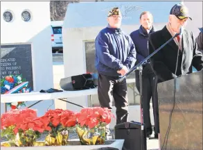  ?? Jean Falbo-Sosnovich / For Hearst Connecticu­t Media ?? Residents and dignitarie­s mark the 77th anniversar­y of Pearl Harbor in Ansonia on Friday.