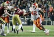  ?? ELISE AMENDOLA — THE ASSOCIATED PRESS FILE ?? Clemson defensive lineman Christian Wilkins (42) rushes in against Boston College.