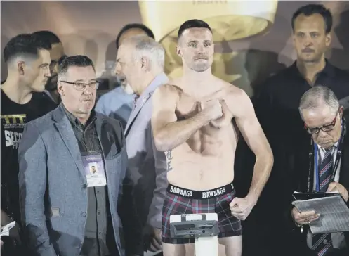  ??  ?? 0 Josh Taylor was 100 grammes over the limit at the weigh- in for tonight’s world title fight and was forced to go away and sweat it off.