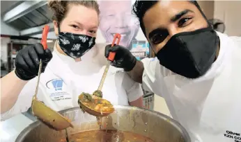  ?? SHELLEY KJONSTAD ?? CHEFS with Compassion Jodi Gillespie and Oliver Reddy have made huge quantities of soup, which they cooked at the Eat Greek Kitchen based at Greyville, to serve to the needy on Mandela Day today. | ANA