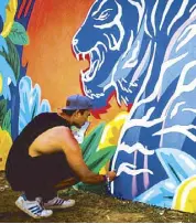  ??  ?? Field work: This year’s Wanderland also commission­ed artists to create live art, including Jappy Agoncillo.