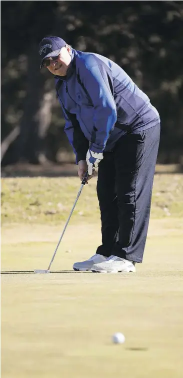  ?? GREG SOUTHAM ?? Wayne Sayler plays his first round of golf for the year at Victoria Golf Course on Friday. The course is “almost like mid-May shape,” its head profession­al says.