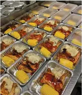  ?? MYRON HICKS/PROVIDED BY CHICAGO DELIVERS ?? Dirty Birds Southern Kitchen provided more than 1,800 warm, fresh meals to Chicagoans through a partnershi­p with Chicago Delivers.