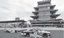  ?? THE ASSOCIATED PRESS ?? William Byron crosses the Yard of Bricks to win the NASCAR Xfinity series race at Indianapol­is Motor Speedway on Saturday.