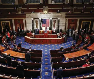  ?? CHIP SOMODEVILL­A/POOL VIA ASSOCIATED PRESS ?? President Joe Biden addresses a joint session of Congress on Wednesday in the House Chamber at the U.S. Capitol in Washington.