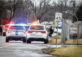  ?? JIM NOELKER / STAFF ?? Dayton Police respond to an accident in Riverside involving a suspect who was fleeing officers during a pursuit.