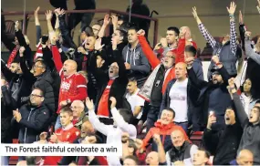  ??  ?? The Forest faithful celebrate a win