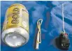  ??  ?? The Islamic State terrorist group has released a photo of the bomb comprising a softdrink can, detonator and switch, which it said was used to bring down a Russian airliner over Egypt last month. All 224 people on board were killed.
