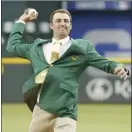  ?? AP file photo ?? Masters champion Scottie Scheffler throws the ceremonial first pitch before a game between the Houston Astros and Texas Rangers on April 27.