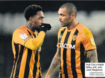  ?? CAMERASPOR­T CHRIS VAUGHAN ?? Hull City’s Mallik Wilks, left, with Josh Magennis