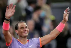  ?? Associated Press ?? Rafael Nadal acknowledg­es the crowd in Madrid.