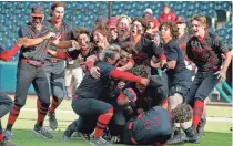  ?? BRYAN TERRY/THE OKLAHOMAN ?? Duncan celebrates after winning the Class 5A baseball state championsh­ip game against Piedmont at Chickasaw Bricktown Ballpark on Saturday.