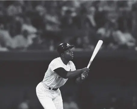  ?? Jack Harris, The Associated Press file ?? In April 1971, Hank Aaron watches his 600th big-league home run during third inning of a National League game against San Francisco in Atlanta.