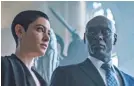  ?? NIKO TAVERNISE ?? The Adjudicato­r (Asia Kate Dillon, with Lance Reddick) arrives in New York with a bone to pick.