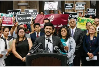  ?? RALPH BARRERA / AMERICAN-STATESMAN ?? Austin City Council Member Greg Casar joins local and state leaders and grass-roots organizati­ons from across Texas in announcing support for litigation against Texas to stop the Senate Bill 4 law, which was signed by the governor, at a rally Tuesday...