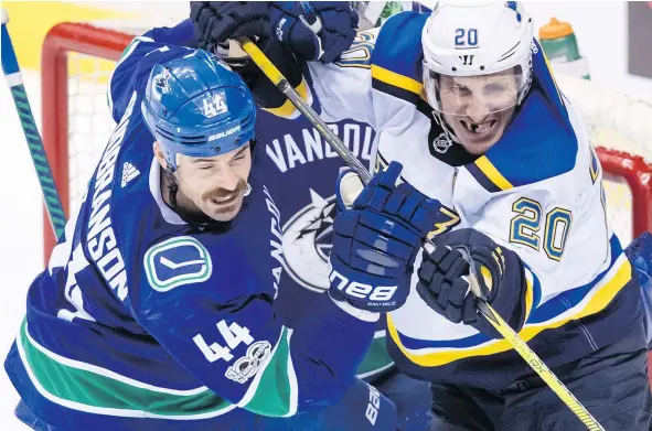  ?? — THE CANADIAN PRESS FILES ?? Canucks defenceman Erik Gudbranson says he enjoys being tasked with shutting down scoring threats such as St. Louis Blues forward Alexander Steen. The Canucks signed Gudbranson to a contract extension Tuesday hoping he can do just that.