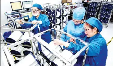  ?? AFP ?? A fibre-optic cable factory in Nantong, China. The US and China have impetus to try and reach a trade deal, but their relationsh­ip has become more contentiou­s.