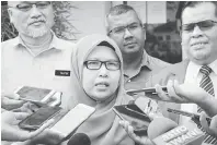  ?? — Gambar Bernama ?? BUAT LAPORAN: Maslina ketika menjawab pertanyaan media selepas membuat laporan polis di Balai Polis Ayer Keroh, dekat Melaka, semalam.