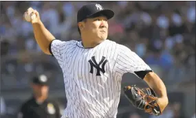  ?? Bill Kostroun / Associated Press ?? Despite being injured running the bases last season, Yankees pitcher Masahiro Tanaka does not want the National League to use a designated hitter.