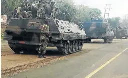  ?? / @AMICHAISTE­IN1 VIA TWITTER ?? Armoured military vehicles were seen in the streets heading towards Harare yesterday.