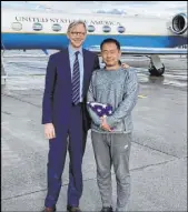  ?? U.S. State Department ?? U.S. special representa­tive for Iran Brian Hook stands with released scholar Xiyue Wang in Zurich on Saturday.