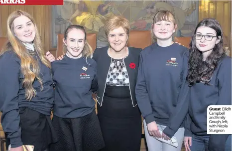  ??  ?? Guest Eilidh Campbell and Emily Gough, left, with Nicola Sturgeon