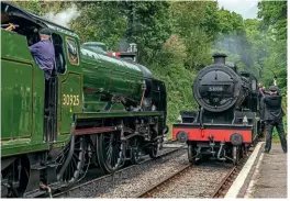  ?? JAMES CORBEN ?? Crossing paths at Medstead & Four Marks are No. 30925 Cheltenham and SDJR No. 53808.