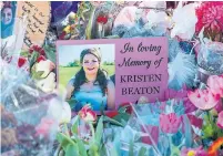 ?? ANDREW VAUGHAN THE CANADIAN PRESS FILE PHOTO ?? A photo of Kristen Beaton is displayed at a memorial in Debert, N.S. in April, 2020. Beaton is among the victims of a murder rampage that claimed 22 lives last year.