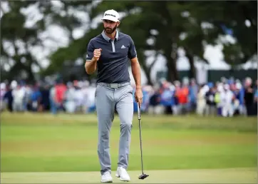  ?? AP PHOTO BY SETH WENI ?? Dustin Johnson reacts Friday after making a putt for birdie on the fourth green during the second round of the U.S. Open Golf Championsh­ip in Southampto­n, N.Y.