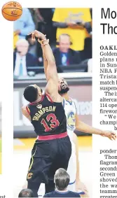  ?? — AFP photo ?? Tristan Thompson (front) of the Cleveland Cavaliers and Kevin Durant of the Golden State Warriors jump for the tip-off in Game 1 of the 2018 NBA Finals at Oracle Arena in Oakland.