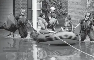  ?? AP PHOTO ?? Rescue personnel evacuate residents as flooding continues in the aftermath of Hurricane Florence in Spring Lake, N.C., Monday.