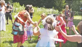  ?? Flanders Nature Center / Contribute­d photo ?? Fairies of all ages enjoy a dance at a previous Fairy Festival.