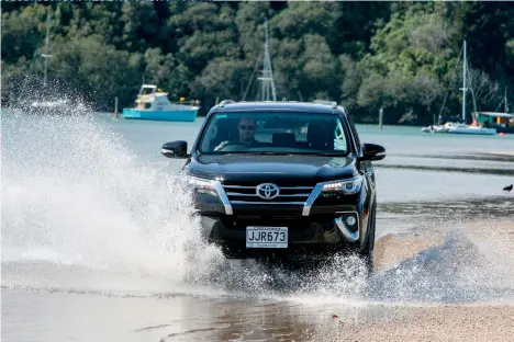  ??  ?? Sand can be dodgy to drive on, but the Fortuner and Trailblaze­r are set up for beach launching boats or surf-casting adventures.